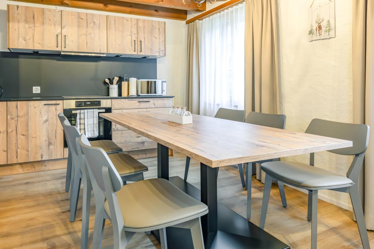 Apartment Eiger - Aare Jungfrau Ag Grindelwald Buitenkant foto